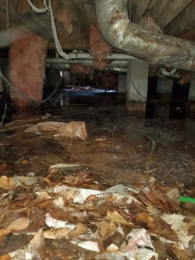 Crawl space flood assessment for Commercial Water Damage Restoration in Danvers